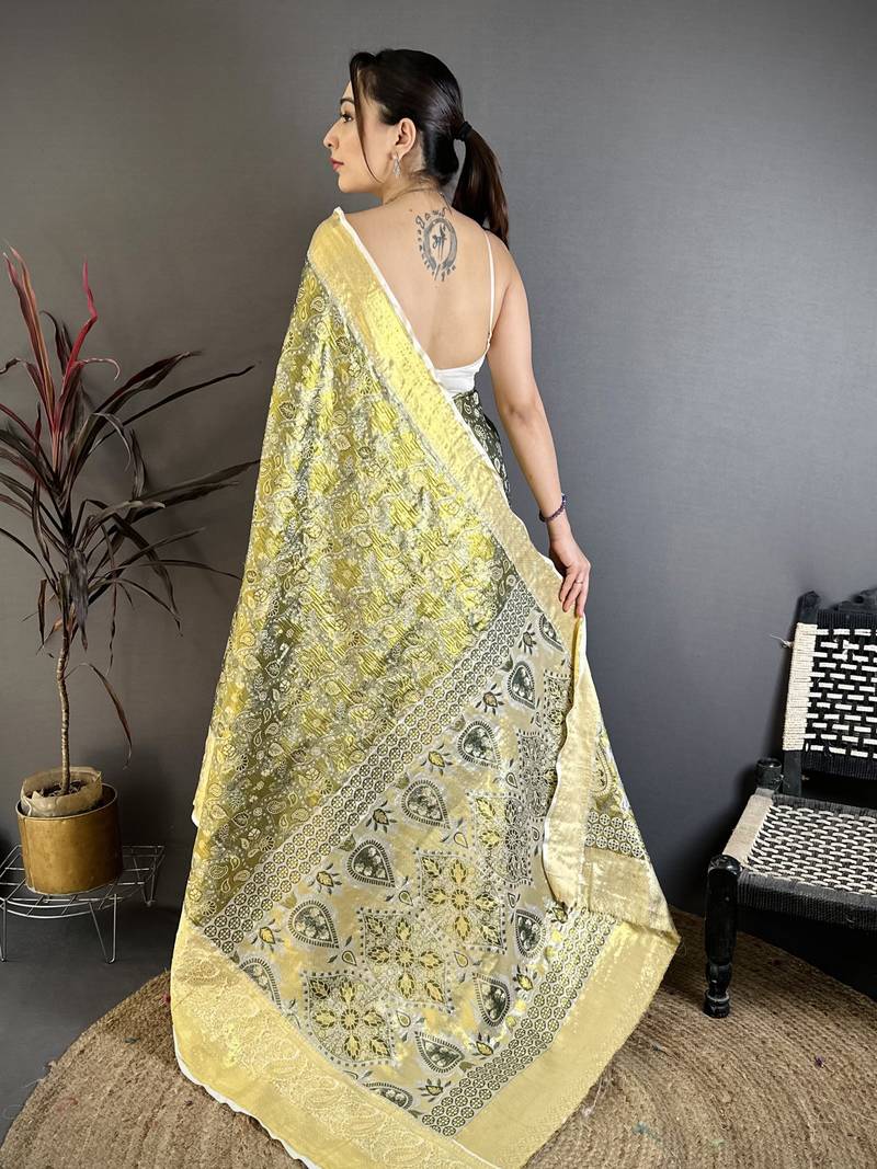 olive kanjeevaram silk blend zari woven saree with unstitched blouse piece.