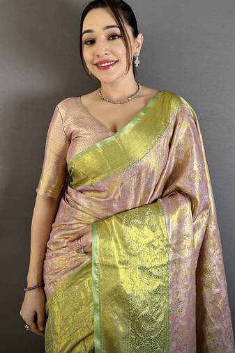 pink kanjeevaram silk blend zari woven saree with unstitched blouse piece.