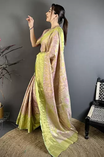 pink kanjeevaram silk blend zari woven saree with unstitched blouse piece.