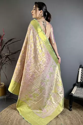 pink kanjeevaram silk blend zari woven saree with unstitched blouse piece.