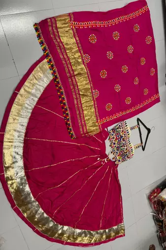 Rani-Pink Rayon Navratri Lehenga Choli | Garba & Dandiya Outfit with Rani-Pink Embroidery Sleeveless Sweetheart Neckline