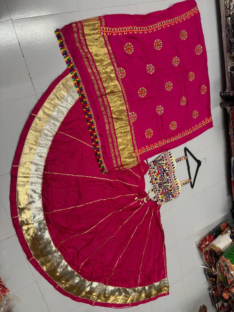 Rani-Pink Rayon Navratri Lehenga Choli | Garba & Dandiya Outfit with Rani-Pink Embroidery Sleeveless Sweetheart Neckline