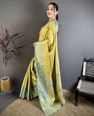 yellow kanjeevaram silk blend zari woven saree with unstitched blouse piece. 3