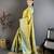 yellow kanjeevaram silk blend zari woven saree with unstitched blouse piece.
