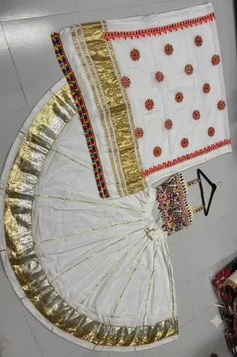 White Rayon Navratri Lehenga Choli | Garba & Dandiya Outfit with White Embroidery Sleeveless Sweetheart Neckline