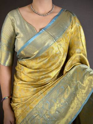 yellow kanjeevaram silk blend zari woven saree with unstitched blouse piece. 4