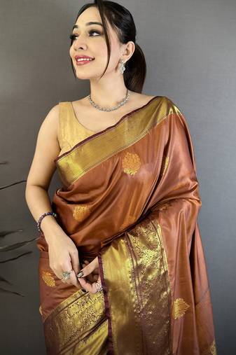 brown soft silk blend zari woven saree with unstitched blouse piece.