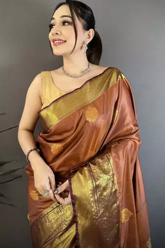 brown soft silk blend zari woven saree with unstitched blouse piece.
