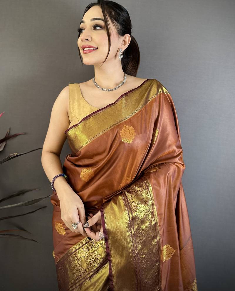 brown soft silk blend zari woven saree with unstitched blouse piece.