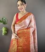 peach tissue silk blend kanjeevaram zari woven saree with unstitched blouse piece.