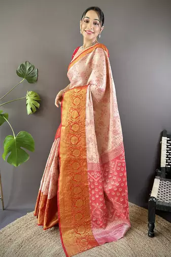 peach tissue silk blend kanjeevaram zari woven saree with unstitched blouse piece.