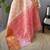 peach tissue silk blend kanjeevaram zari woven saree with unstitched blouse piece.