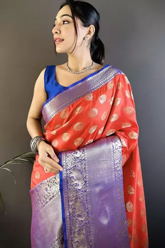 red kanjeevaram silk blend zari woven saree with unstitched blouse piece.