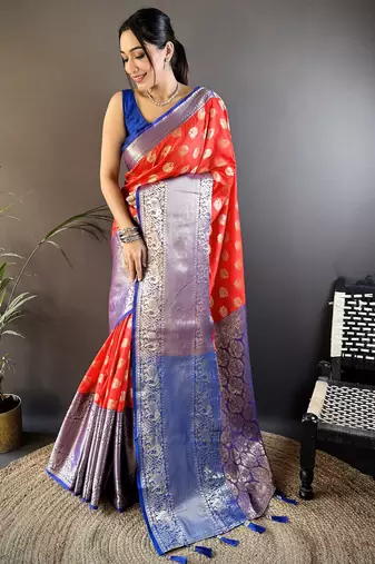 red kanjeevaram silk blend zari woven saree with unstitched blouse piece.