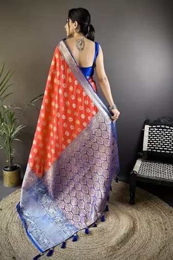 red kanjeevaram silk blend zari woven saree with unstitched blouse piece.