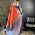 red kanjeevaram silk blend zari woven saree with unstitched blouse piece.