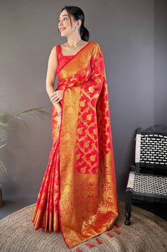 red soft silk blend banarasi zari woven saree with unstitched blouse piece.