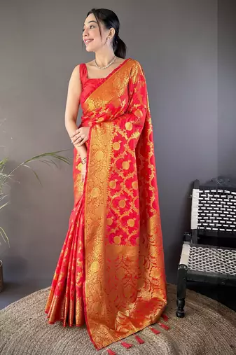 red soft silk blend banarasi zari woven saree with unstitched blouse piece.