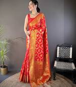 red soft silk blend banarasi zari woven saree with unstitched blouse piece.