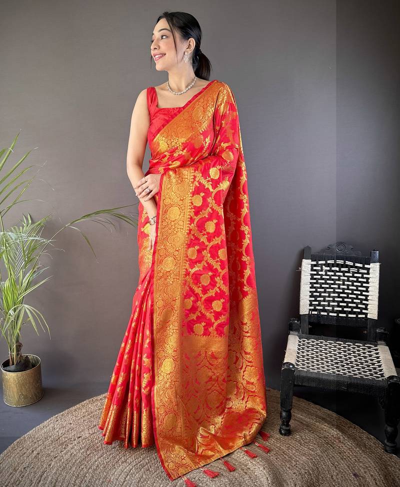red soft silk blend banarasi zari woven saree with unstitched blouse piece.