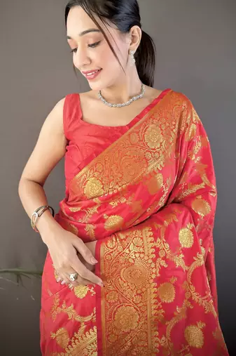 red soft silk blend banarasi zari woven saree with unstitched blouse piece.