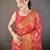 red soft silk blend banarasi zari woven saree with unstitched blouse piece.
