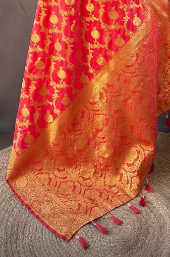 red soft silk blend banarasi zari woven saree with unstitched blouse piece.