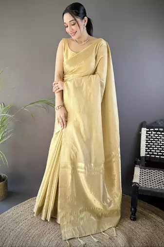 beige soft cotton blend zari checks saree with unstitched blouse piece.