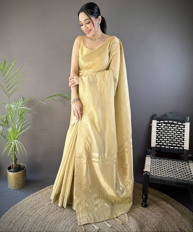 beige soft cotton blend zari checks saree with unstitched blouse piece.