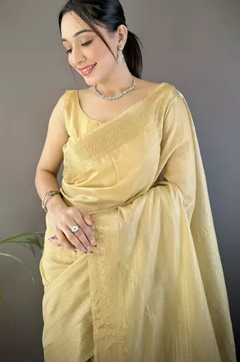 beige soft cotton blend zari checks saree with unstitched blouse piece.