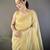 beige soft cotton blend zari checks saree with unstitched blouse piece.