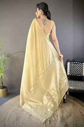 beige soft cotton blend zari checks saree with unstitched blouse piece.