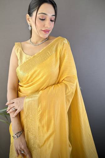 yellow soft cotton blend zari checks saree with unstitched blouse piece.