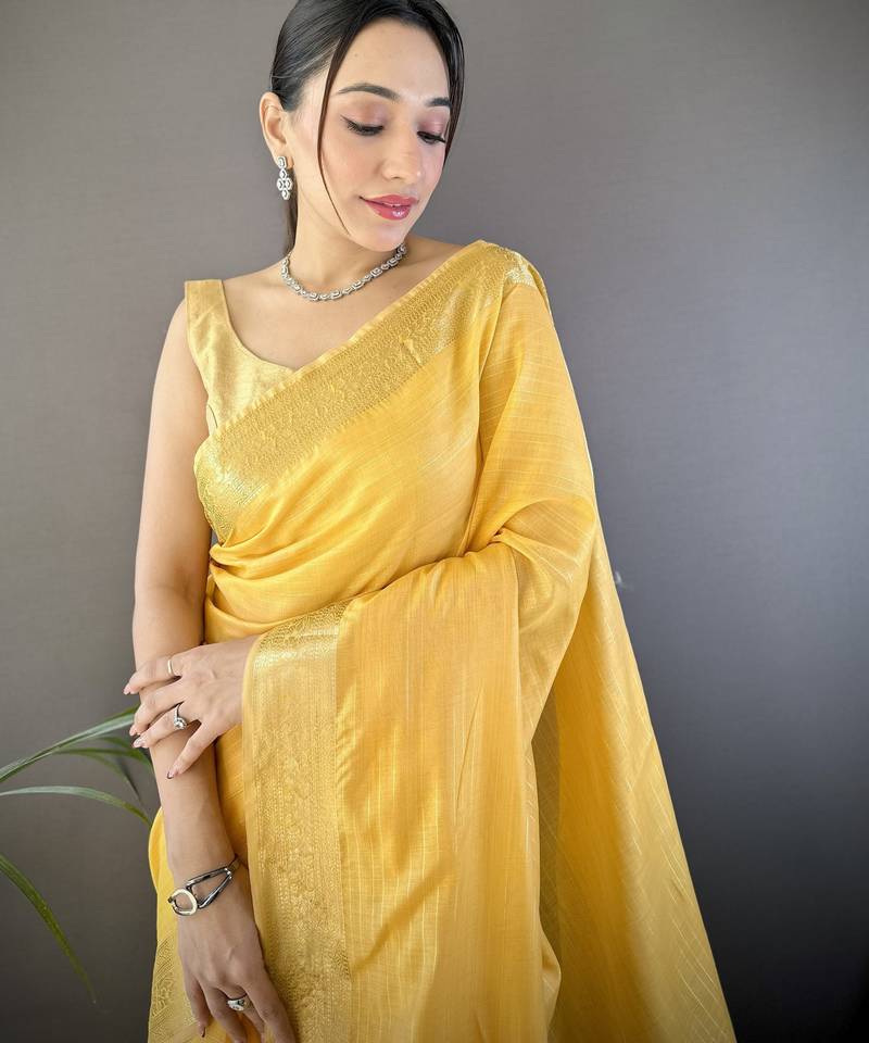 yellow soft cotton blend zari checks saree with unstitched blouse piece.