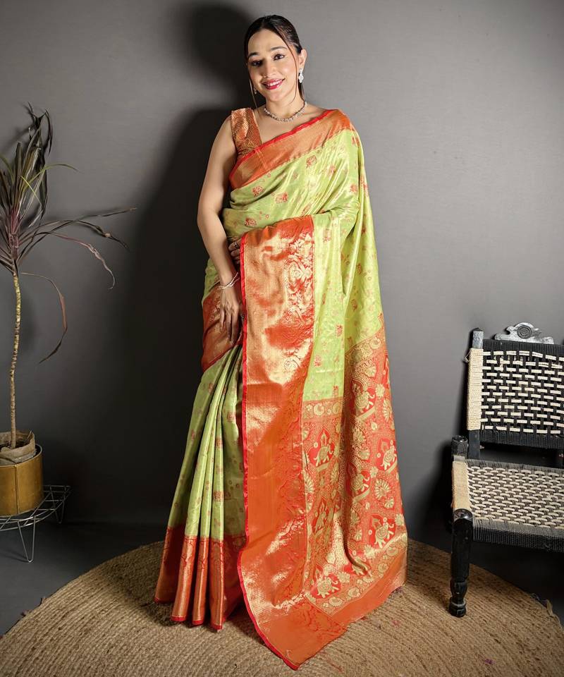 green kanjeevaram silk blend zari woven saree with unstitched blouse piece.