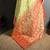 green kanjeevaram silk blend zari woven saree with unstitched blouse piece.