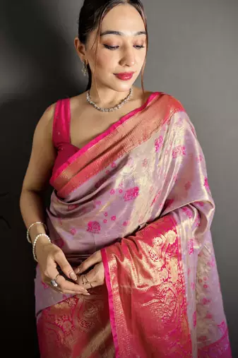 lilac kanjeevaram silk blend zari woven saree with unstitched blouse piece.