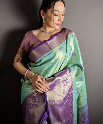 rama kanjeevaram silk blend zari woven saree with unstitched blouse piece. 1