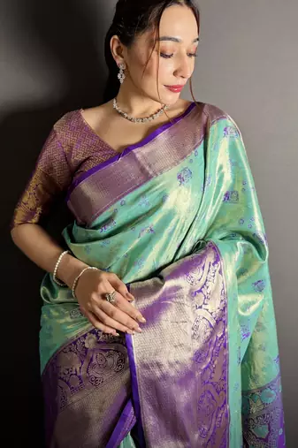 rama kanjeevaram silk blend zari woven saree with unstitched blouse piece.