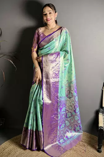 rama kanjeevaram silk blend zari woven saree with unstitched blouse piece.