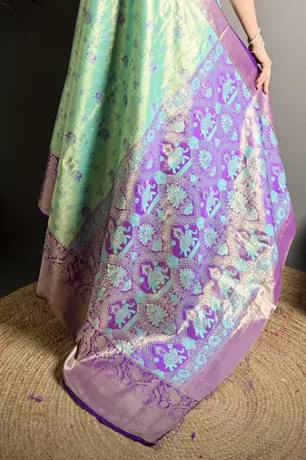 rama kanjeevaram silk blend zari woven saree with unstitched blouse piece.