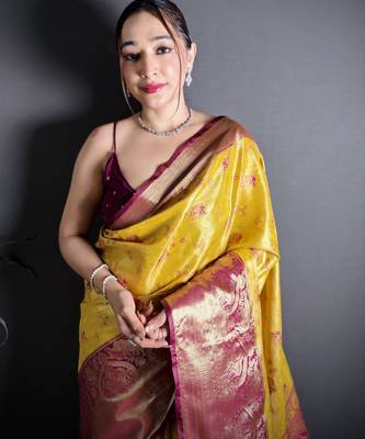 yellow kanjeevaram silk blend zari woven saree with unstitched blouse piece. 1