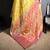 yellow kanjeevaram silk blend zari woven saree with unstitched blouse piece.