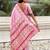 pink satin silk blend banarasi zari woven saree with unstitched blouse piece.