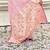 pink satin silk blend banarasi zari woven saree with unstitched blouse piece.