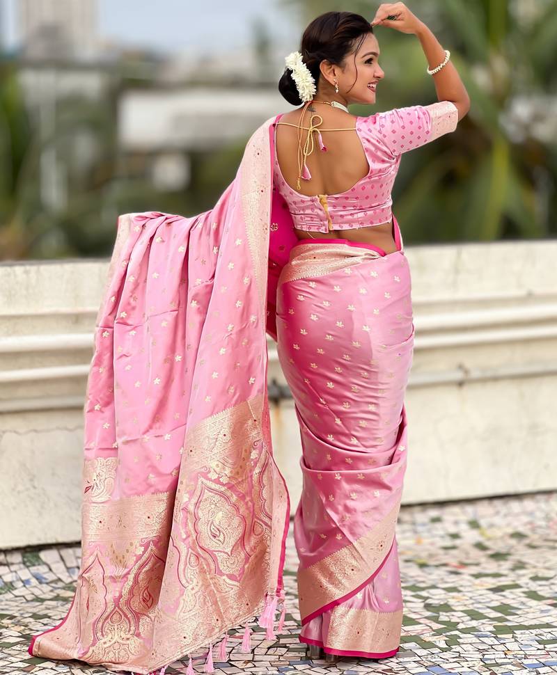pink satin silk blend banarasi zari woven saree with unstitched blouse piece.