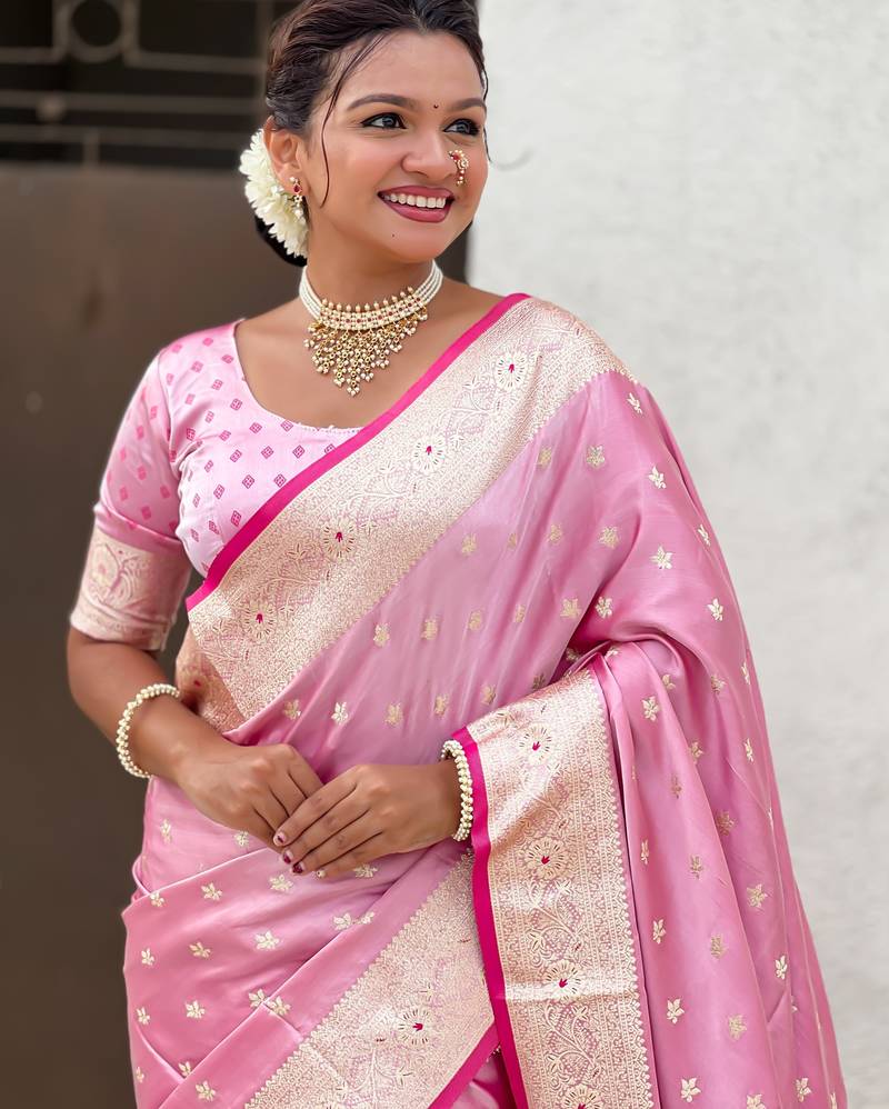 pink satin silk blend banarasi zari woven saree with unstitched blouse piece.