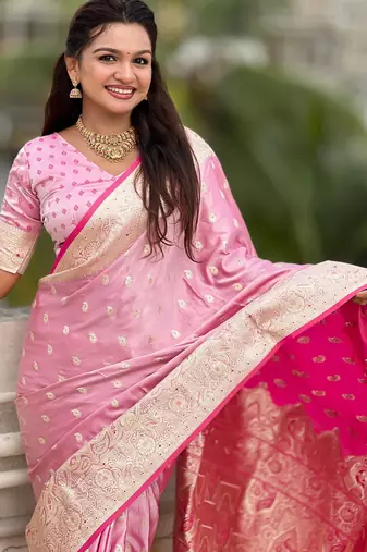pink satin silk blend banarasi zari woven saree with unstitched blouse piece.