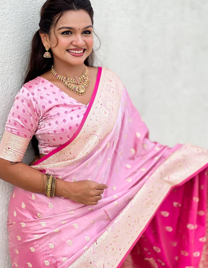 pink satin silk blend banarasi zari woven saree with unstitched blouse piece.