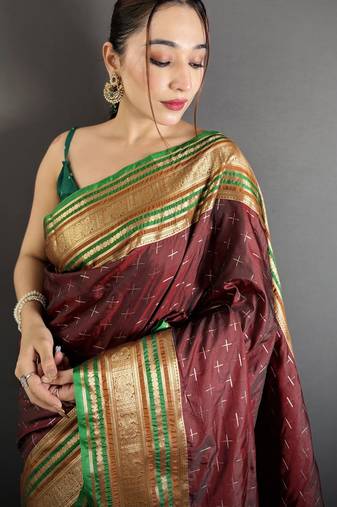 maroon silk blend zari woven saree with unstitched blouse piece.